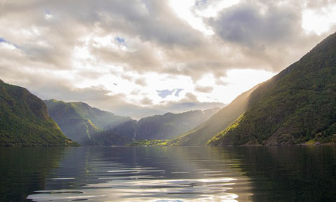 Northern Europe yacht charter with still water and clouds